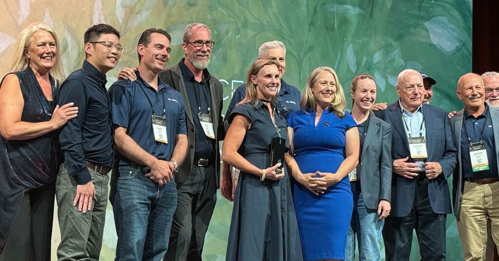 Hagan Kappler and other Daisy members accepting award at CEDIA 2025