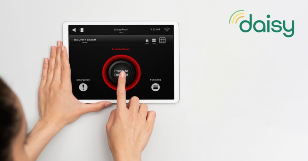 Person using touch panel on the wall to adjust security system