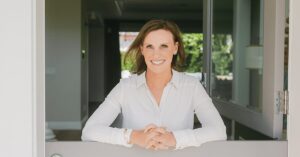 Hagan Kappler wearing a white shirt in a doorway