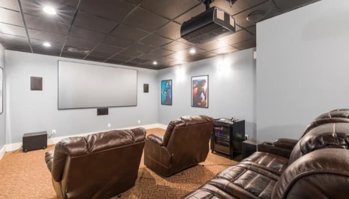 Home theater showing source components in a cabinet
