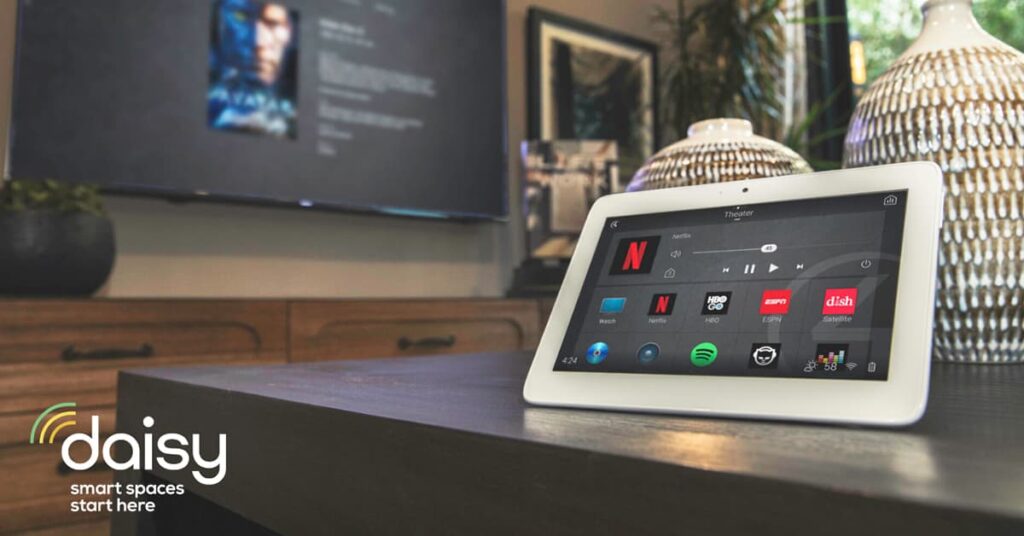 Tablet PC on a table with various apps on it to control smart home tech